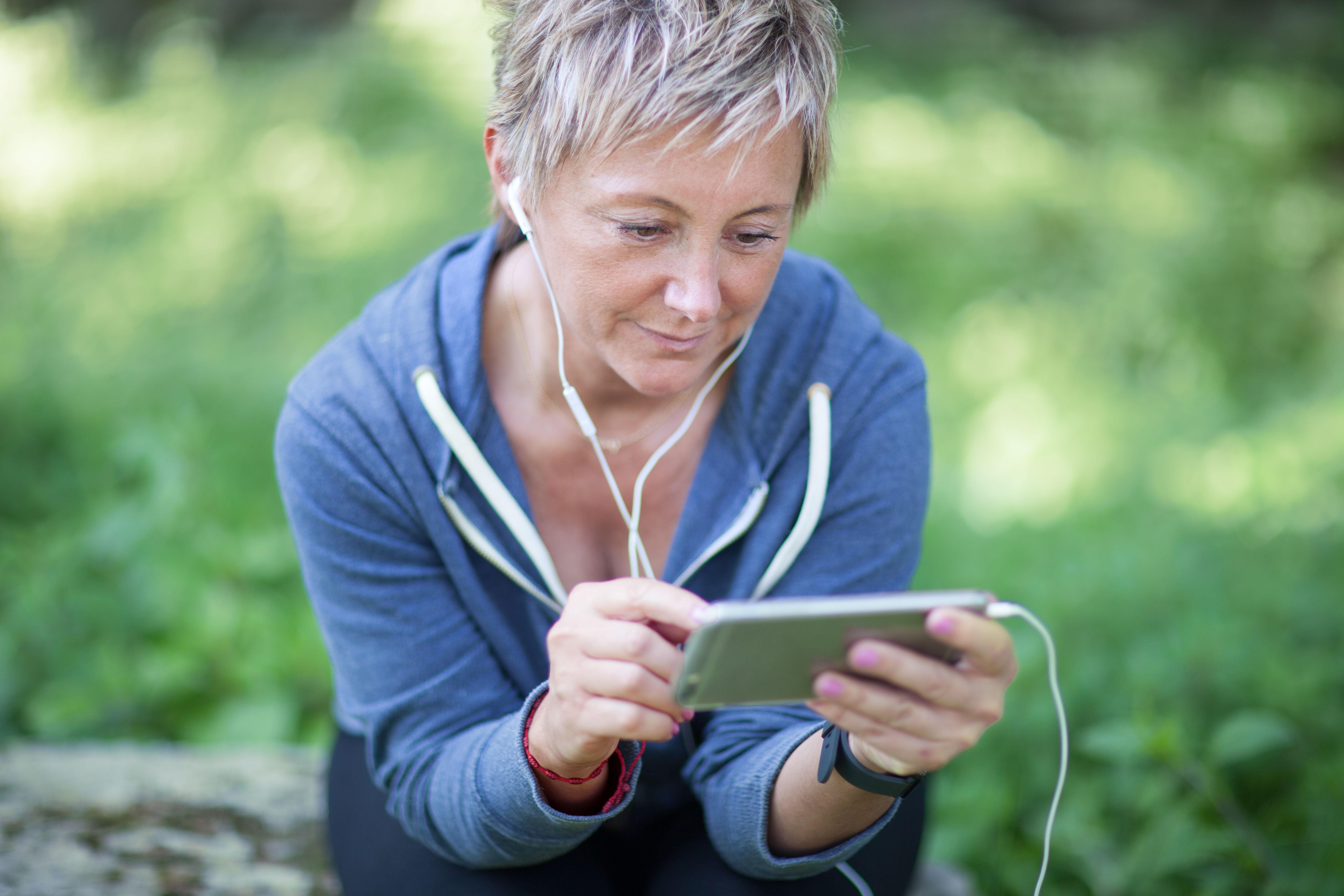 A woman holding her phone