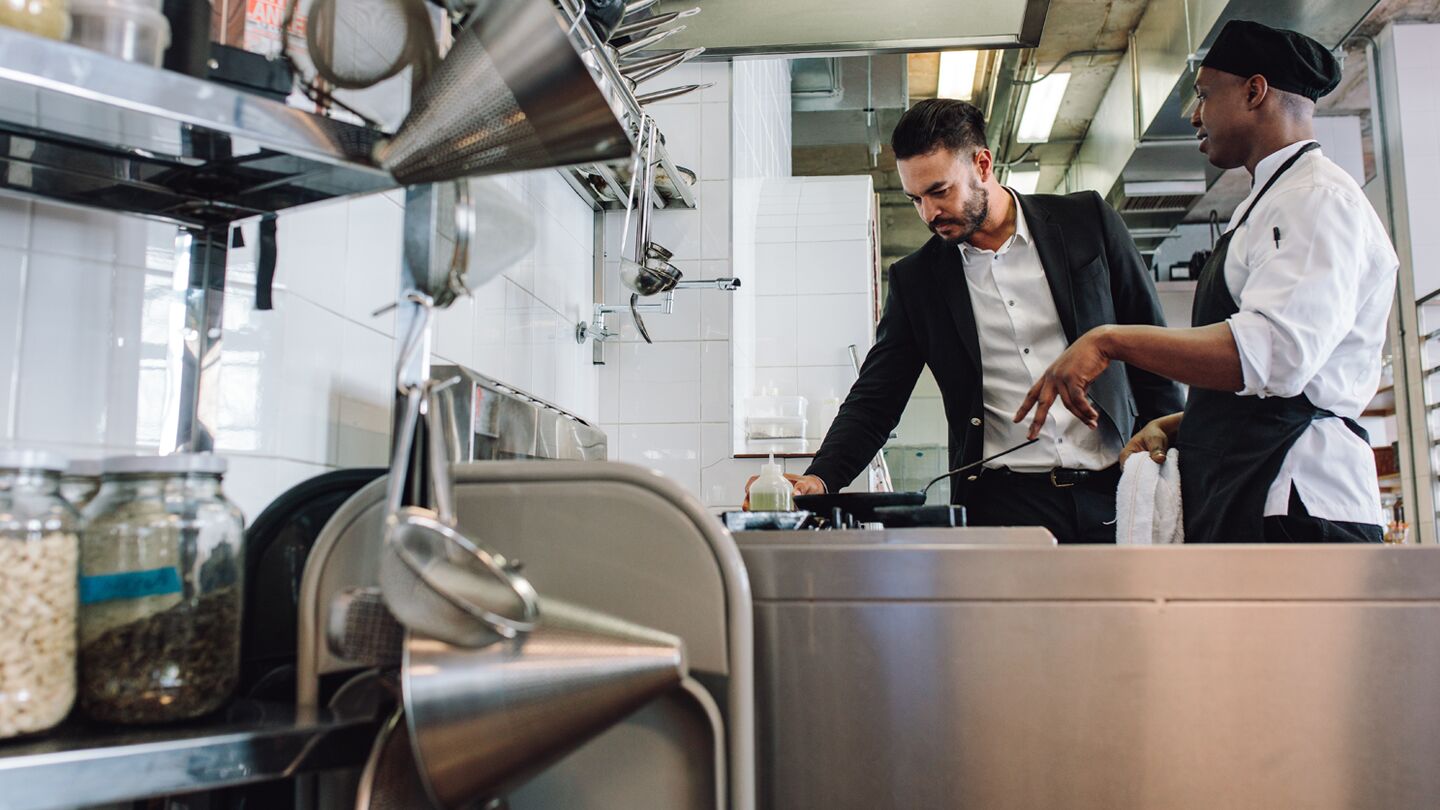 Cooking in a restaurant's kitchen. Cooking in a restaurant's kitchen.
