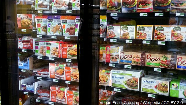 Store freezer containing plant-based protein products which some people call meat. Vegan "meat"