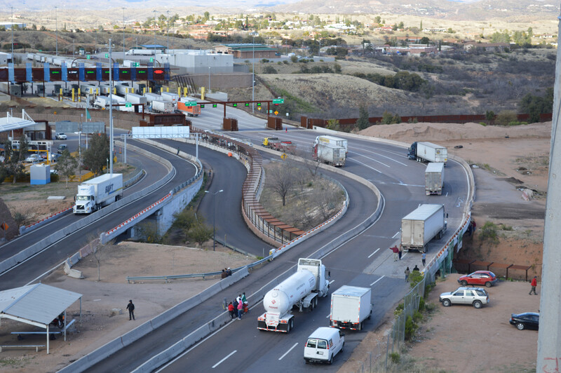 Trucks approach the U.S. border from Mexico at the Nogales Port of Entry into Nogales, Ariz. Trucks from Mexico approach border crossing 1
