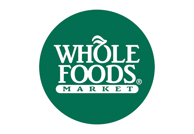 Whole Foods is pulling back on its plan to require GMO labeling for all foods in stores by September.